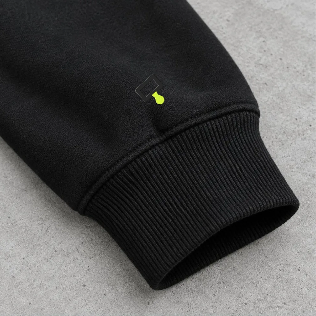 Tonal embroidered mark on the cuff